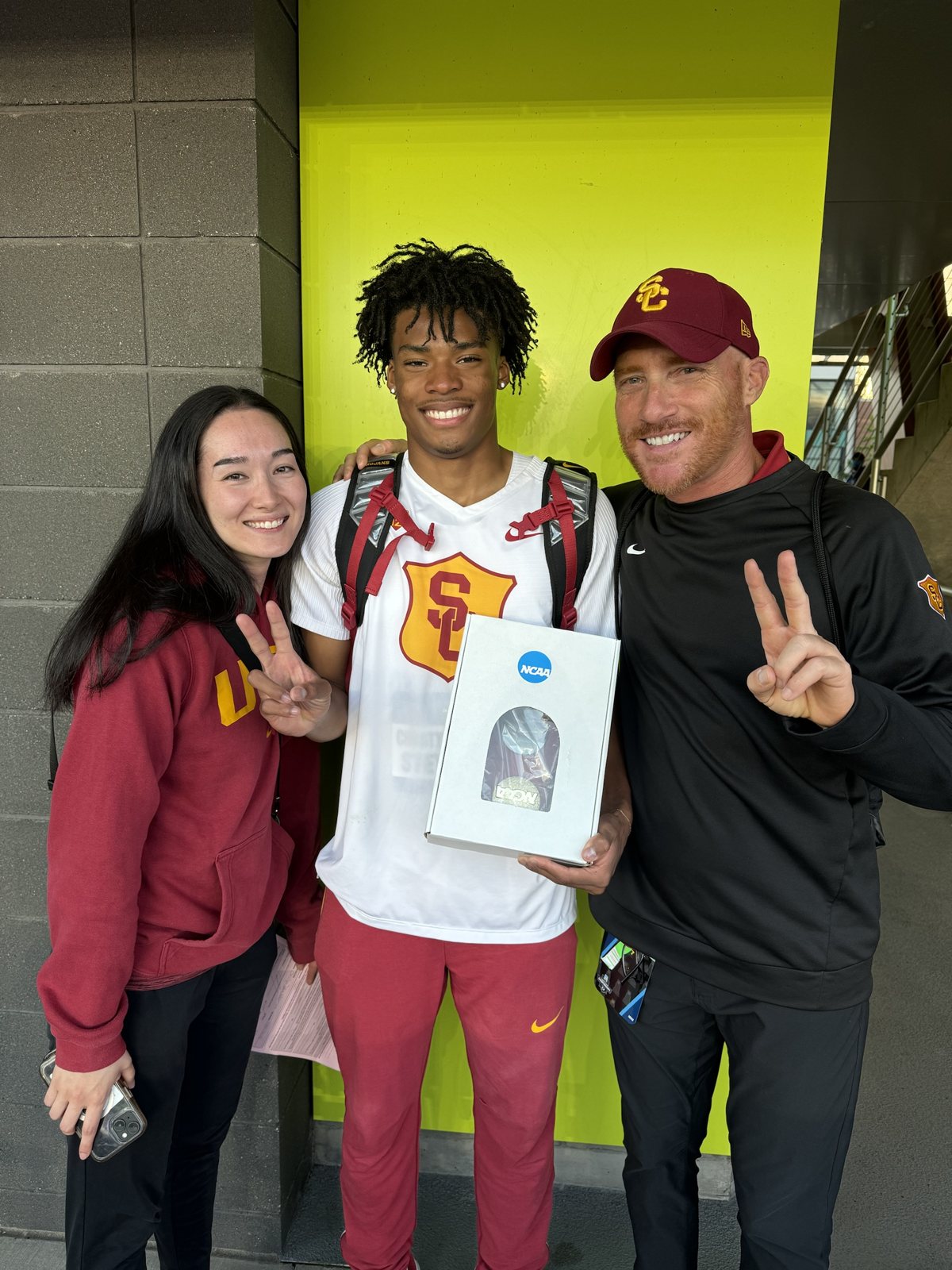 JC Stevenson with his NCAA medal alongside Coach Petersmeyer